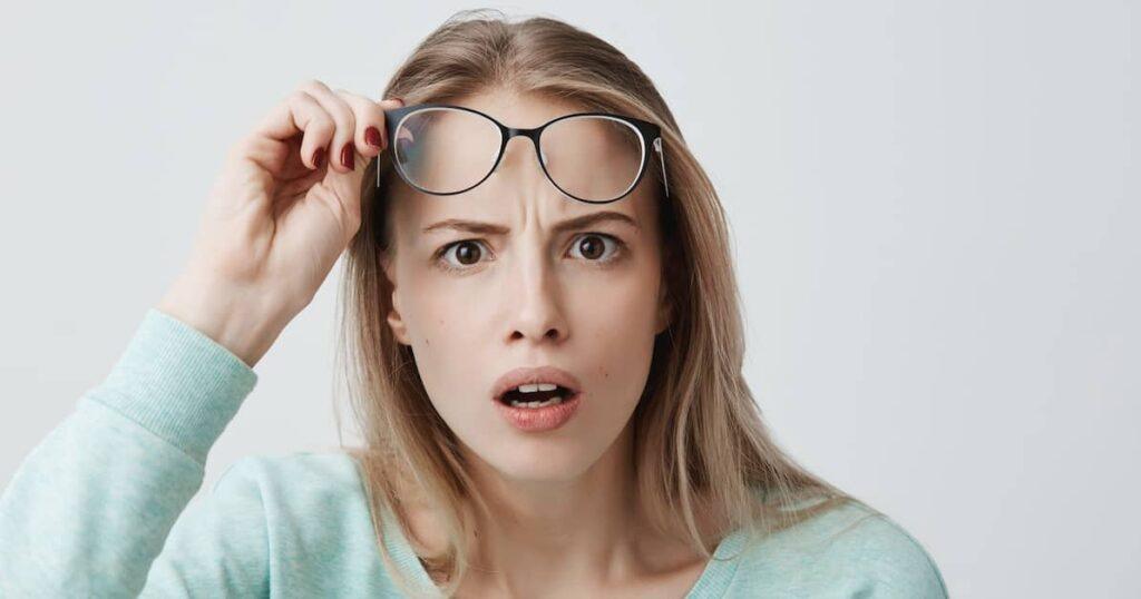 Woman, shocked, wonders, "Why are glasses so expensive?"