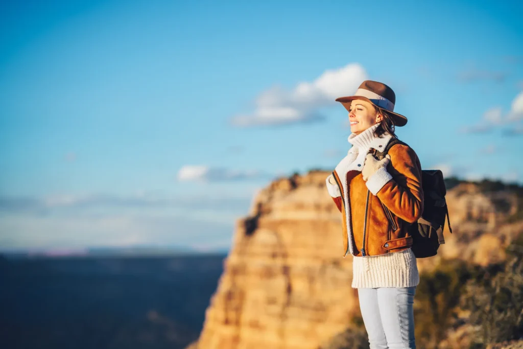 Young hiker with a backpack outdoors