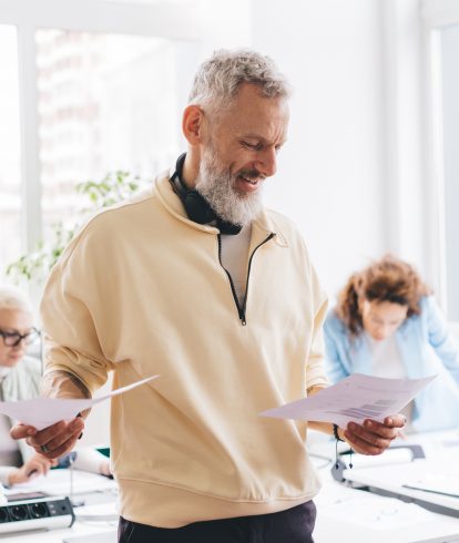 Man reviewing paperwork during a LASIK consultation at an eye clinic